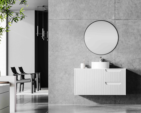 modern minimalist pure white fluted floating vanity | asymmetrical drawer design with vessel sink combo | round mirror bathroom washbasin
